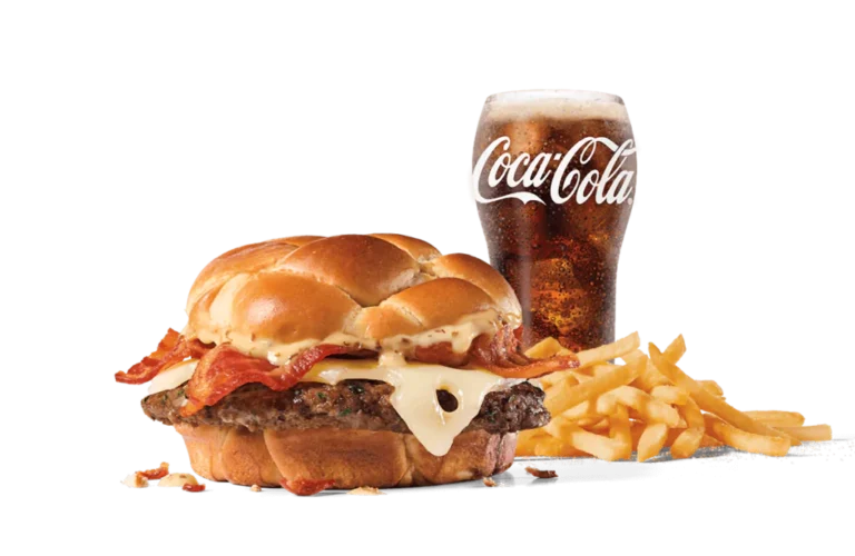 The Bacon Swiss Buttery Jack® Combo features a juicy burger topped with Swiss cheese and crispy bacon, served with golden fries and a refreshing Coca-Cola, beautifully presented on transparent background.