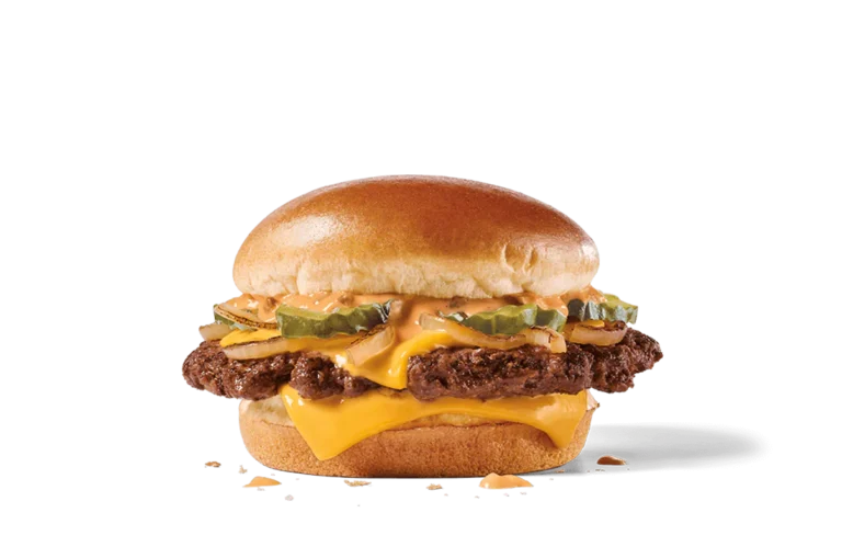Image of a Classic Smashed Jack Burger featuring two smashed beef patties, layered with melted American cheese, topped with pickles and a tangy sauce, all on a soft burger bun.