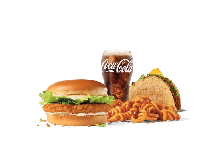 A tantalizing fast food meal featuring a crispy chicken sandwich with lettuce and mayonnaise on a sesame bun, a taco filled with beef and topped with cheese and lettuce, a serving of curly fries, and a glass of Coca-Cola with condensation.