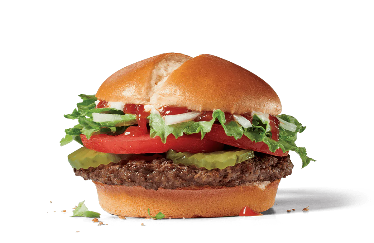 Image of a Classic Jumbo Jack Burger with a single beef patty, topped with slices of fresh tomato, crunchy lettuce, pickles, onions, and a smear of mayonnaise on a toasted bun.
