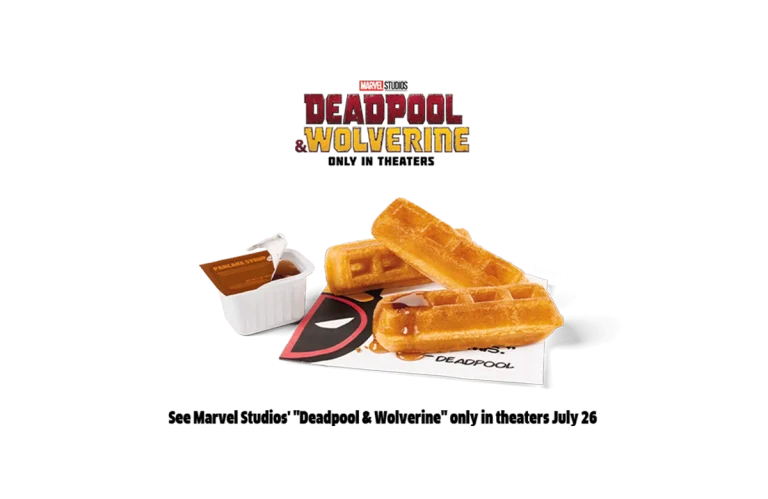 Promotional image for Marvel Studios' "Deadpool & Wolverine" featuring three waffle sticks and dipping sauces on a Deadpool-themed placemat, with the movie title and the premiere date "only in theaters July 26" prominently displayed.