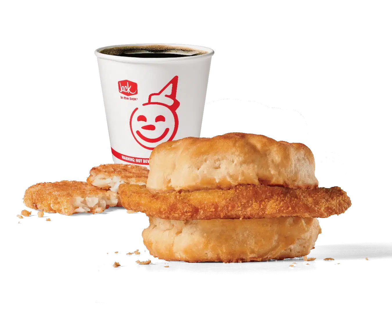 Image of Jack in the Box's Chicken Biscuit Combo featuring a golden crispy chicken fillet nestled in a soft biscuit, accompanied by a hash brown and a coffee cup bearing the playful Jack in the Box logo. The meal is displayed against a transparent background, focusing on the simplicity and appeal of a satisfying breakfast option.