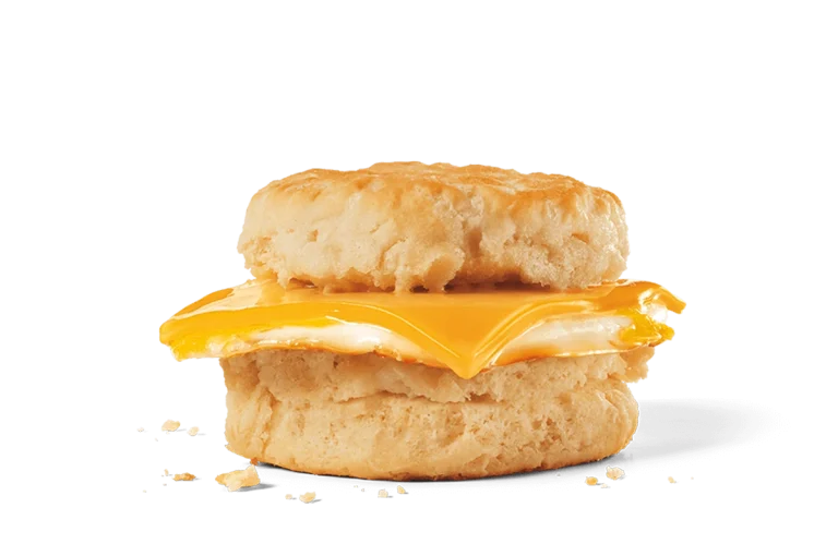 Image of an egg and cheese biscuit featuring a soft, flaky biscuit sandwiching a fluffy, fried egg topped with a slice of melted American cheese, making for a simple yet satisfying breakfast option.