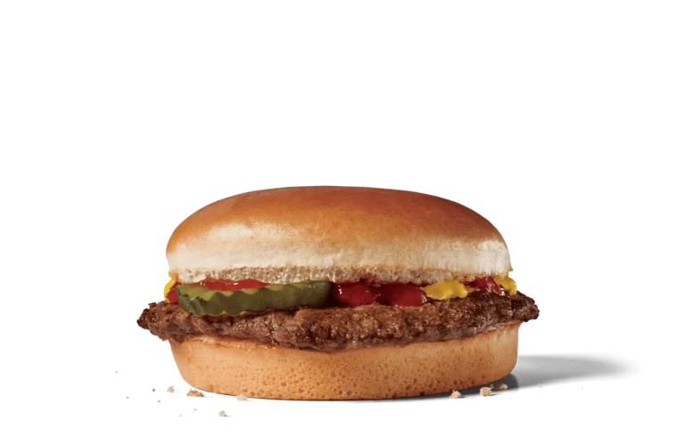 A classic hamburger featuring a sesame seed bun, a well-cooked beef patty, topped with yellow mustard, ketchup, pickles, and a slice of melty cheese. The burger is shown against transparent background, highlighting the simplicity and appetizing look of this all-time favorite fast food item.
