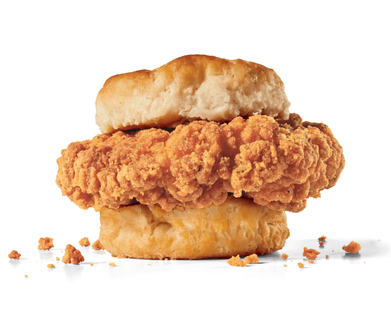 A delicious Homestyle Chicken Biscuit featuring a crispy fried chicken filet sandwiched between a fluffy, golden biscuit. Perfect for a hearty breakfast or snack.