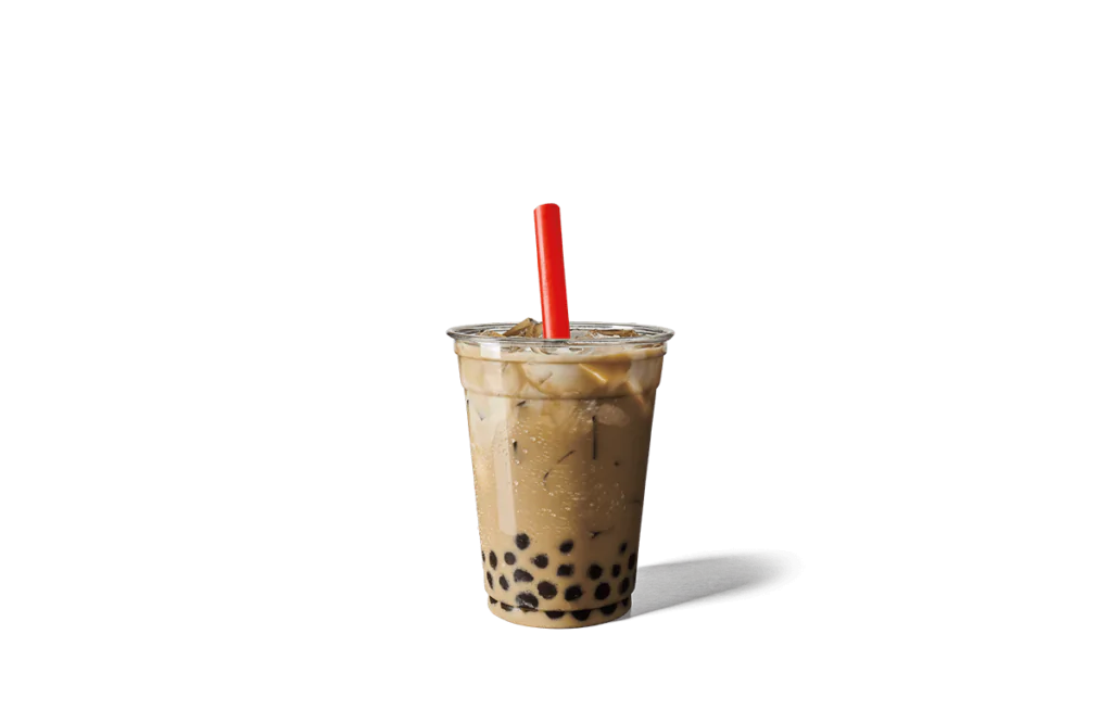 A tall clear plastic cup filled with iced coffee, ice cubes, and black tapioca pearls at the bottom, topped with a red straw. The drink has a rich coffee color and looks cool and refreshing.