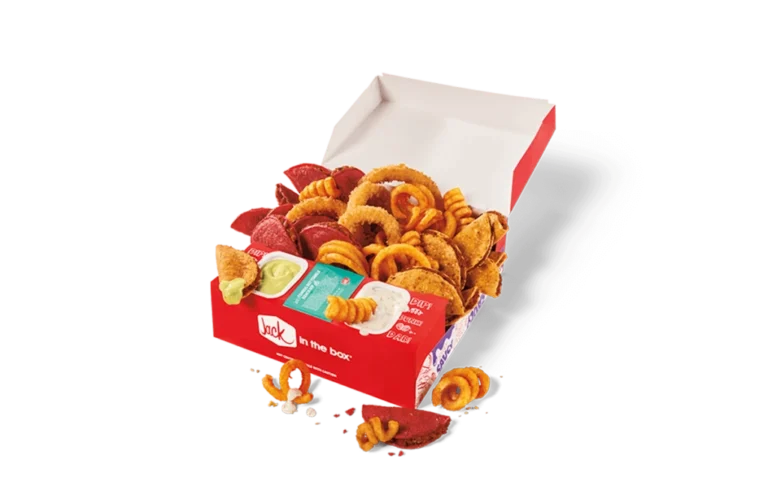 An open Jack in the Box 'Fan Favs' box filled with a variety of snacks. The box includes curly fries, crispy chicken nuggets, mozzarella sticks, and spicy chicken strips, accompanied by small containers of dipping sauces. The presentation is vibrant, with the items neatly arranged in a red and white branded box.