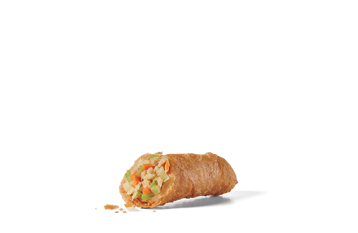 A close-up of a half-sliced jumbo egg roll on transparent background, revealing a filling of finely chopped vegetables including cabbage, carrots, and celery. The egg roll is golden-brown with a crispy, bubbly exterior, and small crumbs are visible around it, suggesting its crunchy texture.