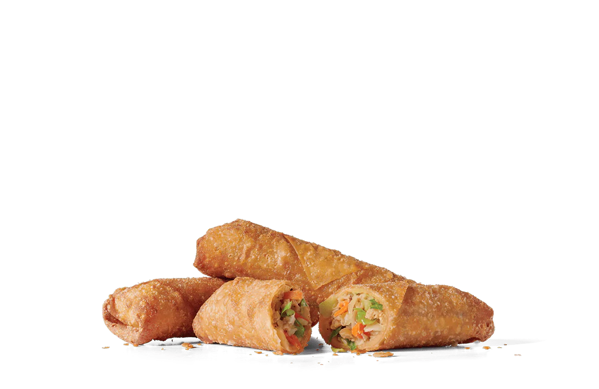 Three crispy vegetable egg rolls on transparent background. The egg rolls are golden-brown, fried to a perfect crisp, and one is cut in half, revealing a colorful filling of shredded cabbage, carrots, and other vegetables. The texture of the egg rolls is visibly crunchy with tiny golden specks.