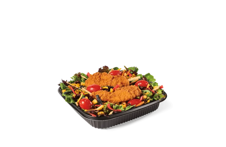 A fresh salad with crispy chicken tenders, featuring cherry tomatoes, mixed greens, black olives, shredded cheese, and a variety of colorful vegetables.